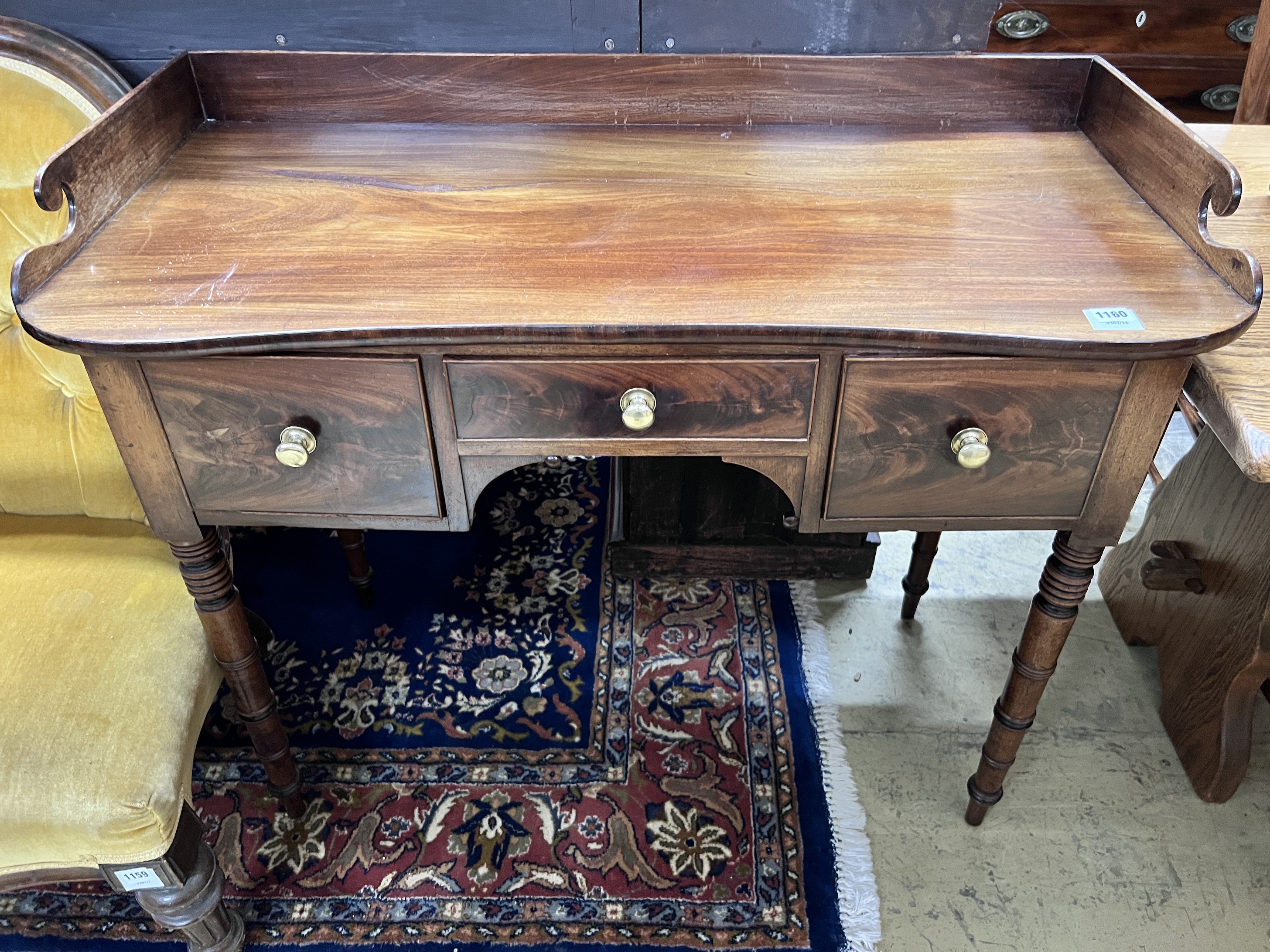A Regency mahogany washstand, width 107cm